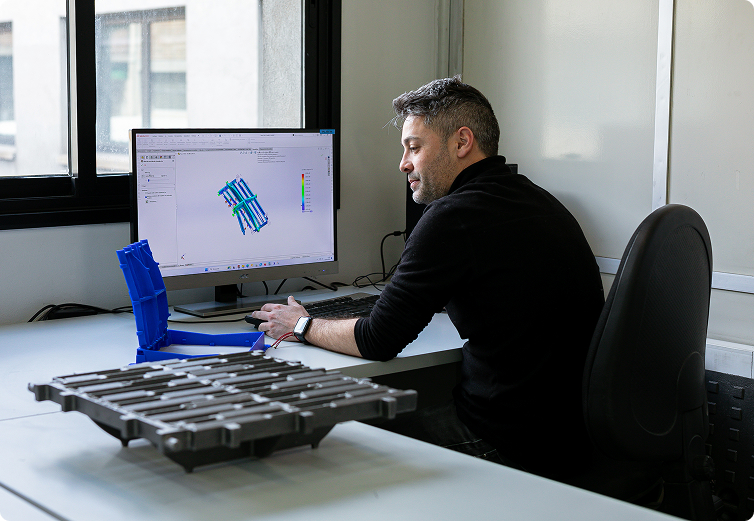 Engineer working on 3D computer design
